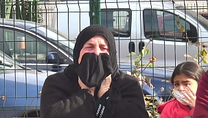 Evinin yanışını ağlayarak izledi